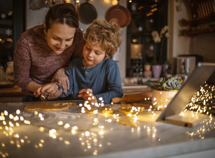 adult and child working on craft project, sparkling lights