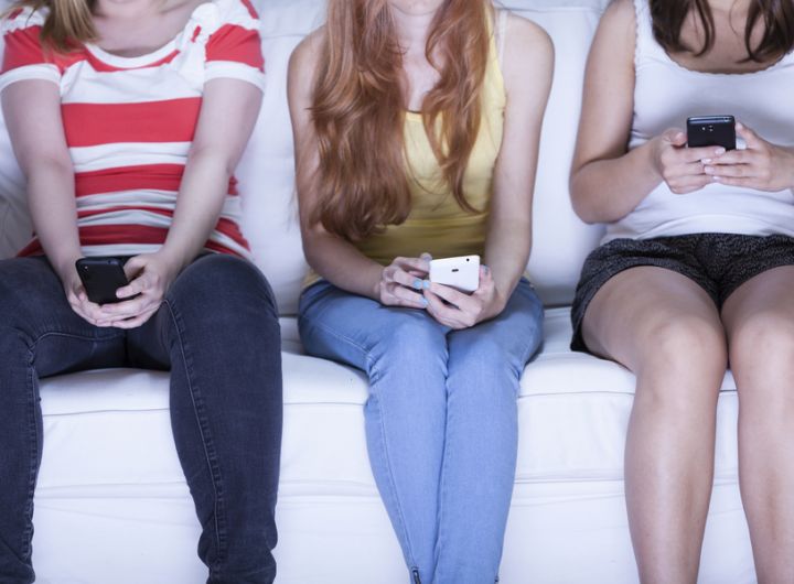 Teenage girls on mobile phones – How to prevent the quest for Facebook friends hurting your kids